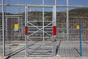 Migrant Prints: The border fence separating Spains northern enclave Ceuta and Morocco is seen from Ceuta