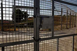 Migrant Prints: The border fence separating Spains northern enclave Ceuta and Morocco is seen from Ceuta