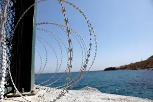 Migrant Prints: The border fence separating Spains northern enclave Ceuta and Morocco is seen from Ceuta