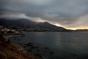 Migrant Prints: The border fence separating Spains northern enclave Ceuta and Morocco is seen from Ceuta
