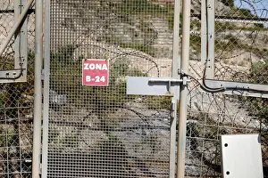 Migrant Prints: The border fence separating Spains northern enclave Ceuta and Morocco is seen from Ceuta