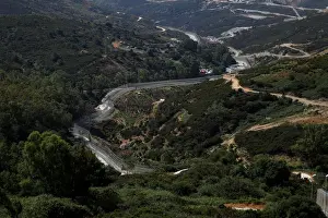 Migrant Prints: The border fence separating Spains northern enclave Ceuta and Morocco is seen from Ceuta