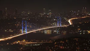 Europe Prints: The Bosphorus Bridge is seen before Earth Hour in Istanbul