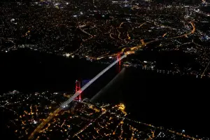 Turkey Prints: Bosphorus strait and the Fatih Sultan Mehmet Bridge are pictured through the window of a
