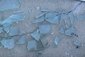 California Prints: Broken glass is seen after a powerful earthquake struck Southern California near the city