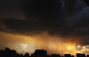 Argentina Prints: Buenos Aires city skylike is seen as a storm approaches at sunset
