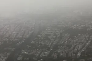 India Prints: Buildings are seen blanketed by haze and dust in New Delhi