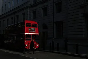 United Kingdom Prints: A bus is parked in a street in central London