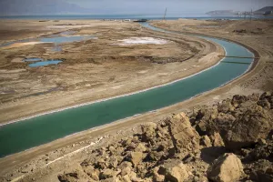 Prints of A canal leading to the Dead Sea is seen in Israel July 27, 2015 Israel Prints: A canal leading to the Dead Sea is seen in Israel