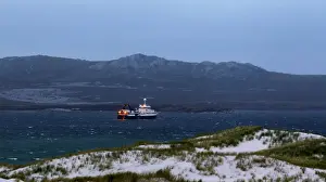 Trending: A cargo ship is seen from Gypsy Cave, off the shore of Port Stanley