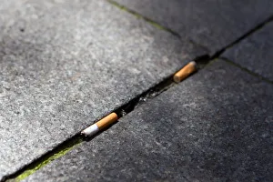 Cigarette butts litter the street in Lyon