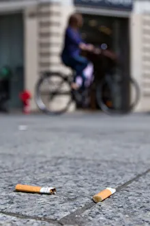 Cigarette butts litter the street in Lyon
