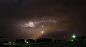 Cloud-to-ground lightning from a tornadic thunderstorm strikes in Perry Cloud-to-ground lightning from a tornadic thunderstorm strikes in Perry