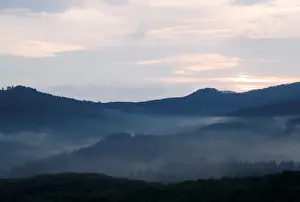 Clouds hang over the Matra mountain range near the village of Galyateto