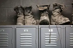 Economy Prints: Coal mining boots are shown above miners lockers before the start of an afternoon shift