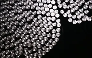Abstract Prints: Cold drawn steel bars are pictured at a production line at Schmolz + Bickenbach