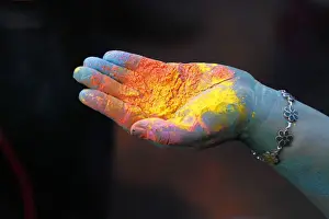 Coloured powder is seen in a participants hand during The Color Run in Caracas