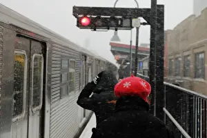 Prints of Commuters prepare to board a subway car at an outdoor station in Brooklyn during a snowstorm in New York, U.S. January 4, 2018. REUTERS/Lucas Jackson USA Prints: Commuters prepare to board a subway car at an outdoor station in Brooklyn during a