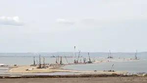 The construction of a bridge across the Kerch Strait to Crimea is seen from the outskirts