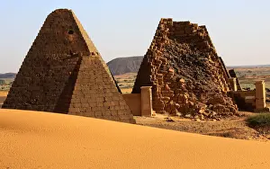 Sudan Prints: Creeping desert sands surround the Royal Cemeteries of Meroe Pyramids in Begrawiya