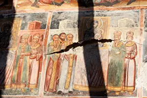 Albania Prints: A damaged fresco is pictured in The Orthodox Church of Saint Athanasios in Leshinca