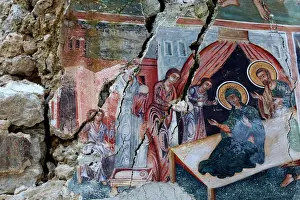 Albania Prints: A damaged fresco is pictured in The Orthodox Church of Saint Athanasios in Leshinca
