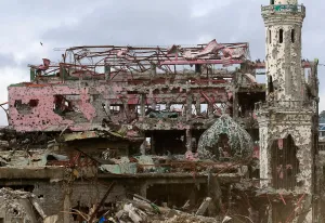 Philippines Prints: Damaged houses, buildings and a mosque are seen inside Marawi city