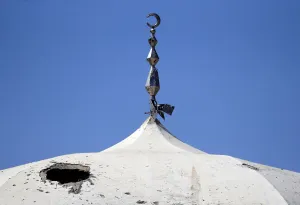 A damaged mosque is seen during a media tour in Douma near Damascus A damaged mosque is seen during a media tour in Douma near Damascus