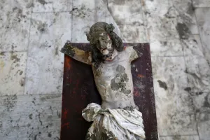 Philippines Prints: A damaged statue of Jesus Christ that was recovered from rubbles is placed in a church in