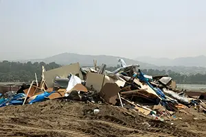 Peru Prints: Debris of huts are seen after police evict squatters from a land in Villa El Salvador