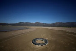 Debris is seen as water levels fall to about 24 percent full at Voelvlei Dam Debris is seen as water levels fall to about 24 percent full at Voelvlei Dam