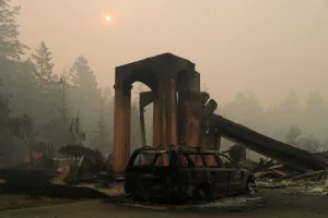California Prints: A destroyed home is seen at a residential neighborhood along Fountaingrove Parkway during