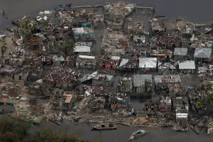 Storm Prints: Destroyed houses are seen in a village after Hurricane Matthew passes Corail
