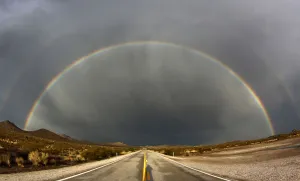 Weather Prints: A double rainbow appears after a heavy monsoon storms over Nipton Road in Searchlight
