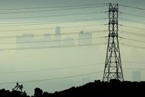 Dailylife Prints: Downtown Los Angeles is seen behind an electricity pylon through the morning marine layer