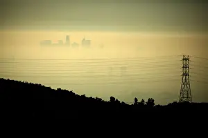 Dailylife Prints: Downtown Los Angeles is seen behind an electricity pylon through the morning marine layer