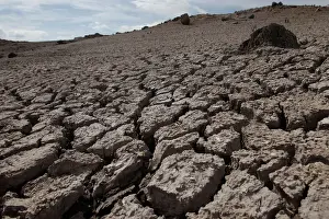 Honduras Prints: Dried mud is seen during a low-level period of water in Concepcion reservoir on