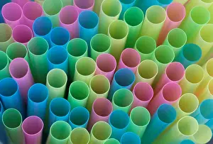Chogm Prints: Drinking straws protrude from a glass in a illustration picture in Loughborough