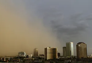 Prints of A dust storm surrounds high rise buildings in Phoenix, Arizona August 18, 2011. REUTERS/Joshua Lott (UNITED STATES - Tags: ENVIRONMENT IMAGES OF THE DAY) USA Prints: A dust storm surrounds high rise buildings in Phoenix