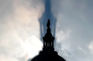 Images Dated 9th January 2018: Early morning fog creates a shadow of the U. S. Capitol dome in Washington