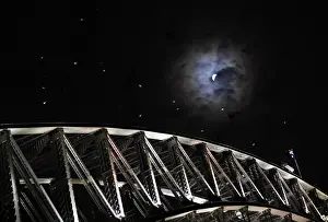 Abstract Prints: Earths shadow falls on the moon as it undergoes a total lunar eclipse above the Sydney