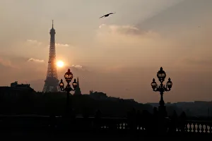 The Eiffel tower is pictured as the sun sets on a winter day in Paris