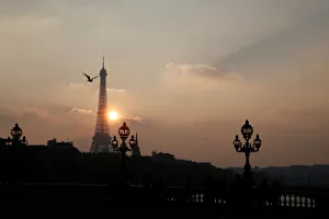 Paris Prints: The Eiffel tower is pictured as the sun sets on a winter day in Paris