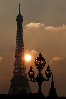 Paris Prints: The Eiffel tower is pictured as the sun sets on a winter day in Paris