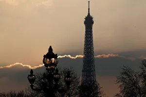 Paris Prints: The Eiffel tower is pictured as the sun sets on a winter day in Paris