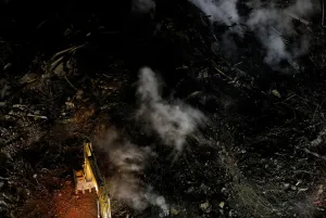 Prints of An excavator removes debris of a building that caught fire and collapsed in the center of Sao Paulo, Brazil May 3, 2018. REUTERS/Nacho Doce Brazil Prints: Excavator removes debris of a building that caught fire