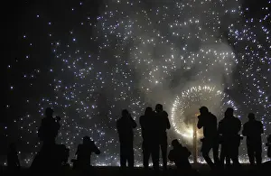 Fire crackers are set-off before effigies of 10-headed demon King Ravana