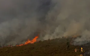 Prints of Firefighters tackle a blaze on Saddleworth Moor, Britain, June 27, 2018. REUTERS/Phil Noble TPX IMAGES OF THE DAY Britain Prints: Firefighters tackle a blaze on Saddleworth Moor