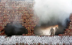 Firefighters try to douse fire that broke out at footwear in New Delhi Firefighters try to douse fire that broke out at footwear in New Delhi