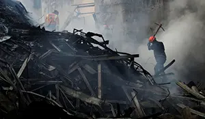 Prints of Firefighters try to extinguish a fire of a building that caught fire and collapsed in the center of Sao Paulo, Brazil May 2, 2018. REUTERS/Nacho Doce TPX IMAGES OF THE DAY Brazil Prints: Firefighters try to extinguish a fire of a building that caught fire